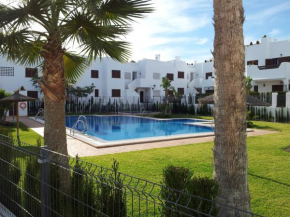 Homes of Spain, Mar de Pulpi fase 1, Apartamento primera linea de playa, bajo con jardin y WIFI, San Juan De Los Terreros